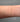 Heart shaped link chain on a wrist