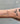 thin silver curb chain on wrist