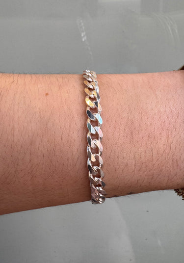 Thick curb chain on a wrist