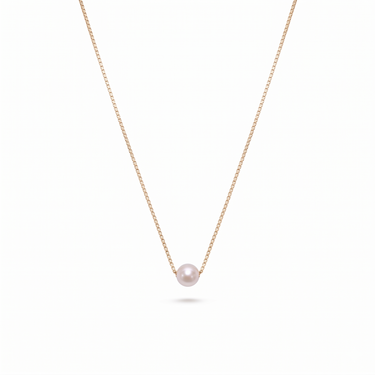 a necklace with a single japanese ayoka pearl at the center