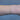 thin 14k gold paperclip chain on a wrist