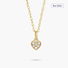 Gold heart-shaped pendant necklace with diamonds on a white background