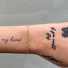 Heart link chain with gold filled links on wrist