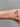 Chunky figaro style silver chain on wrist