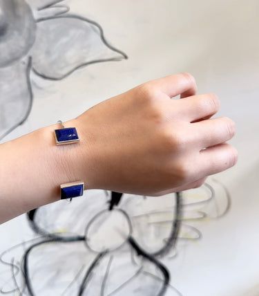 model shot of Amare Wear Baguette Lapis Handcuff Bracelet silver