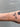 Infinity link gold chain on a wrist