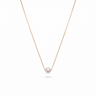 a necklace with a single japanese ayoka pearl at the center