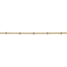 gold filled chain with silver beads on a wrist