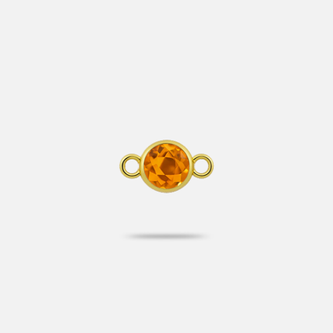 Small yellow gold connector charm with a faceted, round citrine gem.