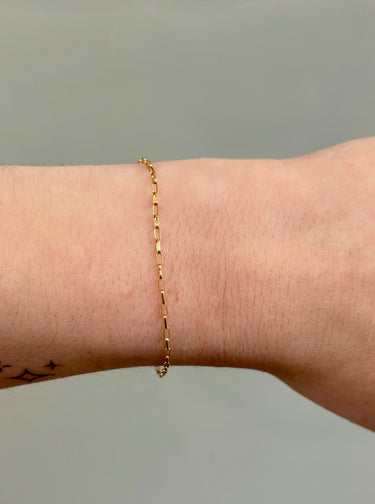 gold filled chain with boxy links on wrist