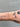 Gold diamond cut curb chain on a wrist