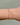 gold chain with diamond shaped links on a wrist