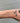 The sterling silver oval linked chain on a model's wrist