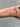 Silver paperclip style chain on wrist
