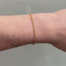 gold filled thin curb chain on wrist