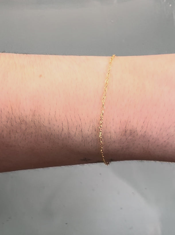 Heart shaped link chain on a wrist